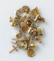 A 9ct yellow gold charm bracelet, hallmarked, 34g
