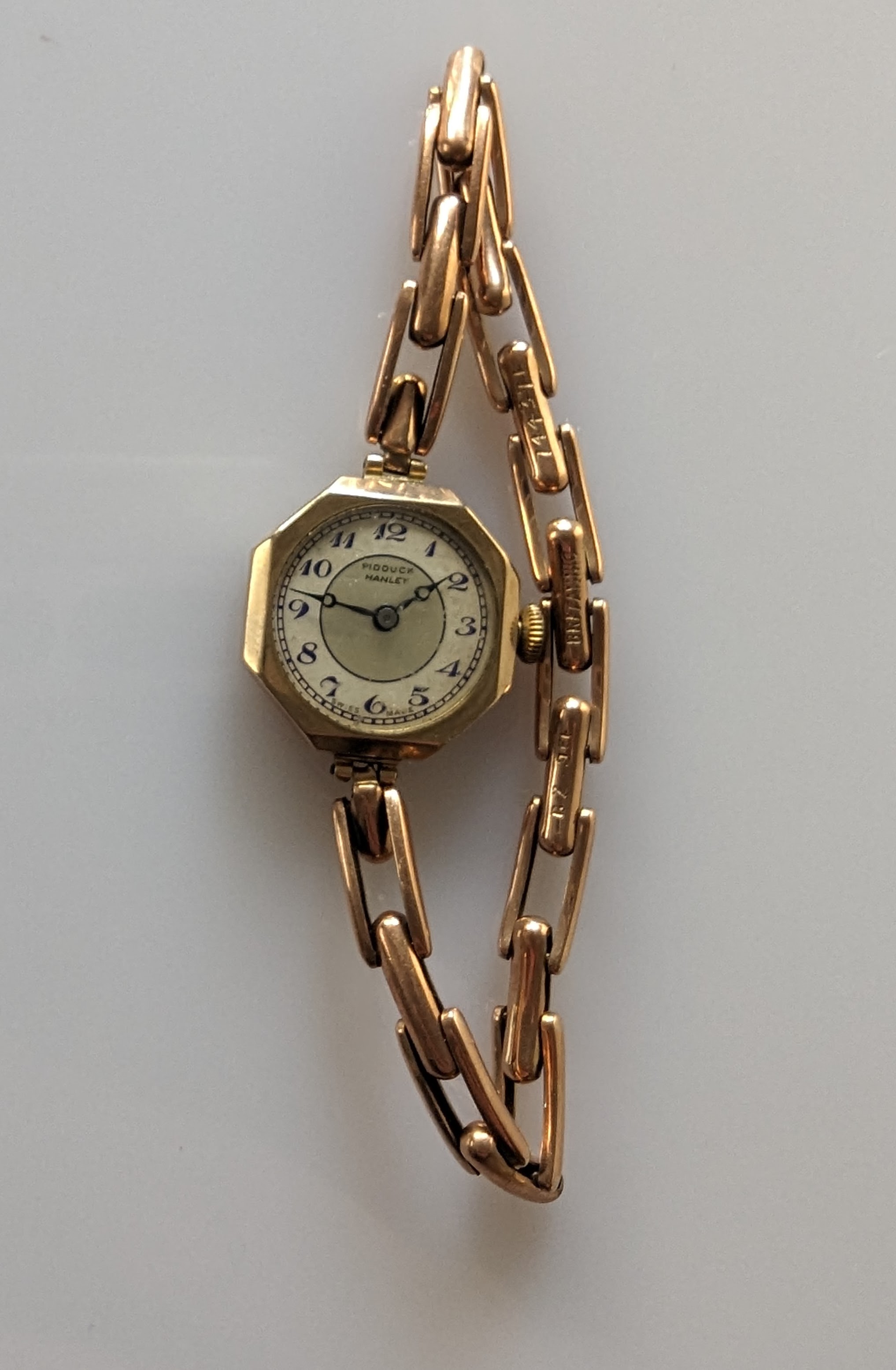 An early 20th century yellow gold-cased ladies wristwatch with octagonal dial, Arabic numerals