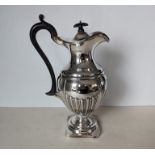 A Victorian silver fluted pedestal wine ewer with hinged cover, wood handle and knop, 26.5 cm H,