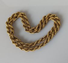A 9ct yellow gold rope-twist necklace, 62 cm, clasp good, hallmarked, 38g