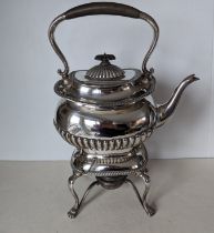 An Edwardian silver tea kettle on stand with fluted decoration, wood handle and knop