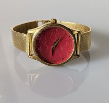 A Metropolitan Museum of Art souvenir watch with an Italian textured 18ct gold strap