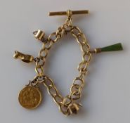 An Edwardian gold full sovereign, 1907, mounted on an 18ct yellow gold curb link bracelet