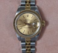 A Rolex lady's Oyster Perpetual Datejust automatic Chronometer wristwatch, model 69193 with gilt fac