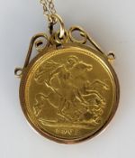 An Edwardian gold half sovereign in a gold mount and chain, both stamped 9ct, 6.2g