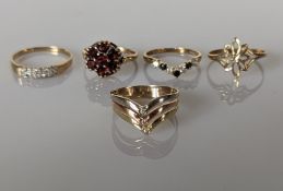 A tri-gold ring with chevron design, 2.65g, three 9ct gold gem-set rings and one other, 6.3g (4)