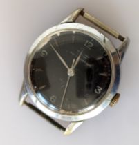 A vintage Tissot with black dial, 25mm, sweeping seconds hand, in a stainless steel case, 30mm