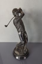 A silver statuette of a golfer, hallmarked, maker's mark HL, Sheffield, 21.5 cm H, weighted