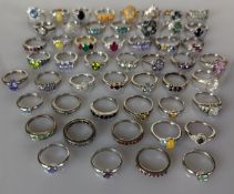 An assortment of fifty gem-set rings, all on a silver setting, stamped 925 or hallmarked, 150g (50)