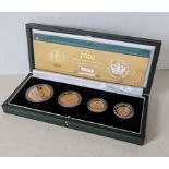 A cased Royal Mint 2002 Queen Elizabeth II Golden Jubilee gold proof sovereign Four Coin Collection