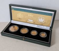 A cased Royal Mint 2002 Queen Elizabeth II Golden Jubilee gold proof sovereign Four Coin Collection