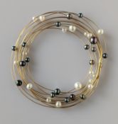 A yellow gold multi-strand bib necklace with pearl decoration, stamped 750, 10.8g