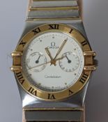 An Omega Quartz Day Date Constellation wristwatch with white dial, dot hour marks, gold bezel,