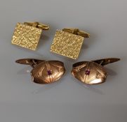A pair of 18ct yellow gold cufflinks of oblong form with textured design, stamped 750, 12g 