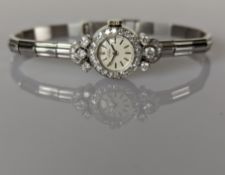 A mid-century Girard Perregaux ladies 18ct white gold cocktail watch with diamond decoration