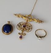 An Edwardian yellow gold brooch with amethyst and seed pearl decoration, 55 x 50mm, hallmarked
