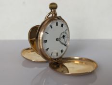 A George V yellow gold-cased full hunter pocket watch with Roman numerals, subsidiary seconds hand