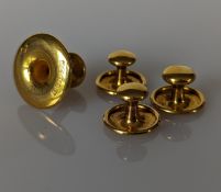 A cased set of gold shirt buttons, each hallmarked 15ct for Owen Powell, Birmingham, 1946, 3.5g