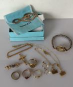 Three gem-set gold rings, one gold signet ring; an Edwardian brooch with amethyst decoration