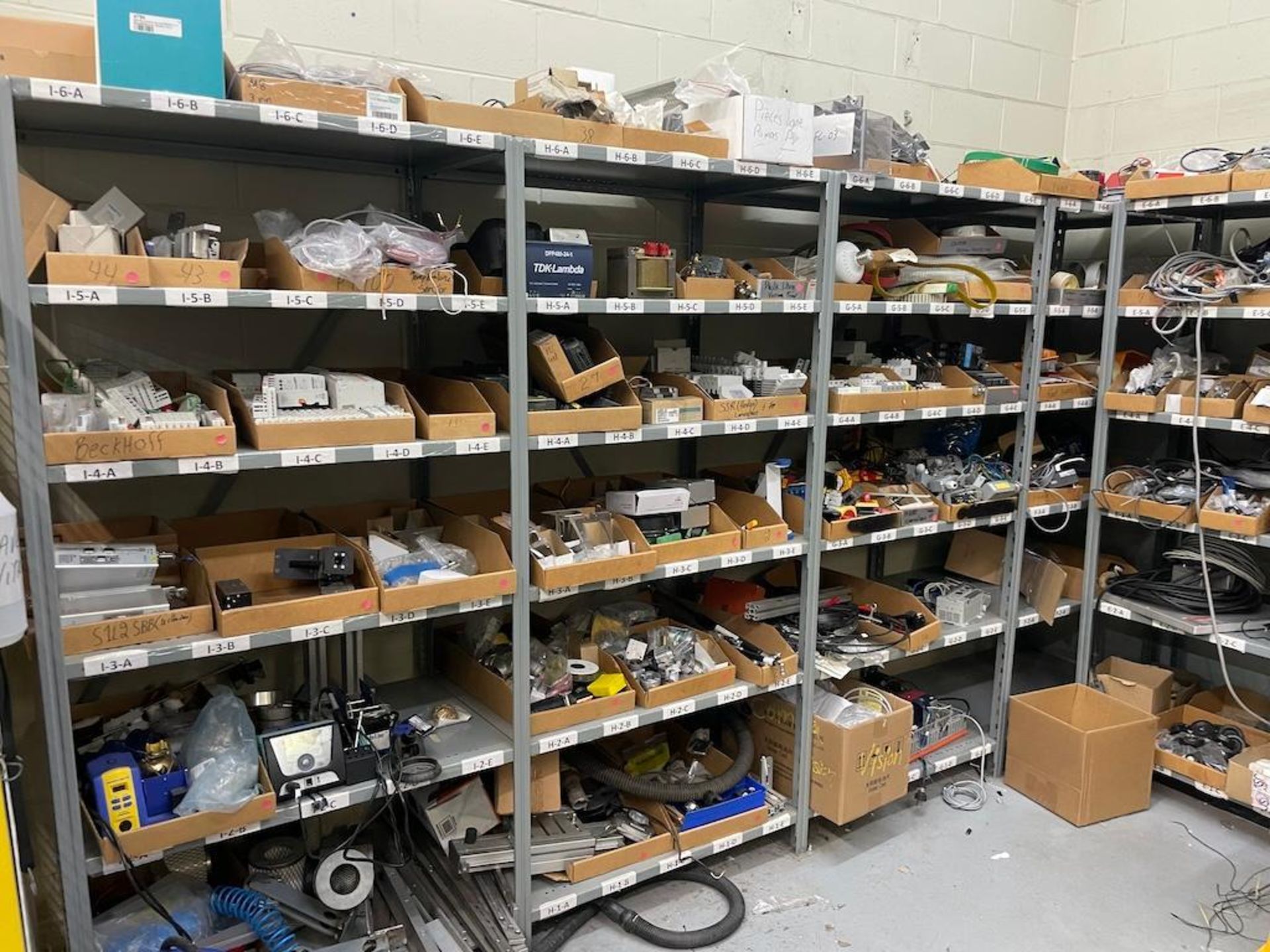 LOT CONTENTS (2) MAINTENANCE AND SUPPLY ROOMS INCLUDING: (9) METAL RACKS W ELECTRICAL COMPONENT AND - Image 2 of 18