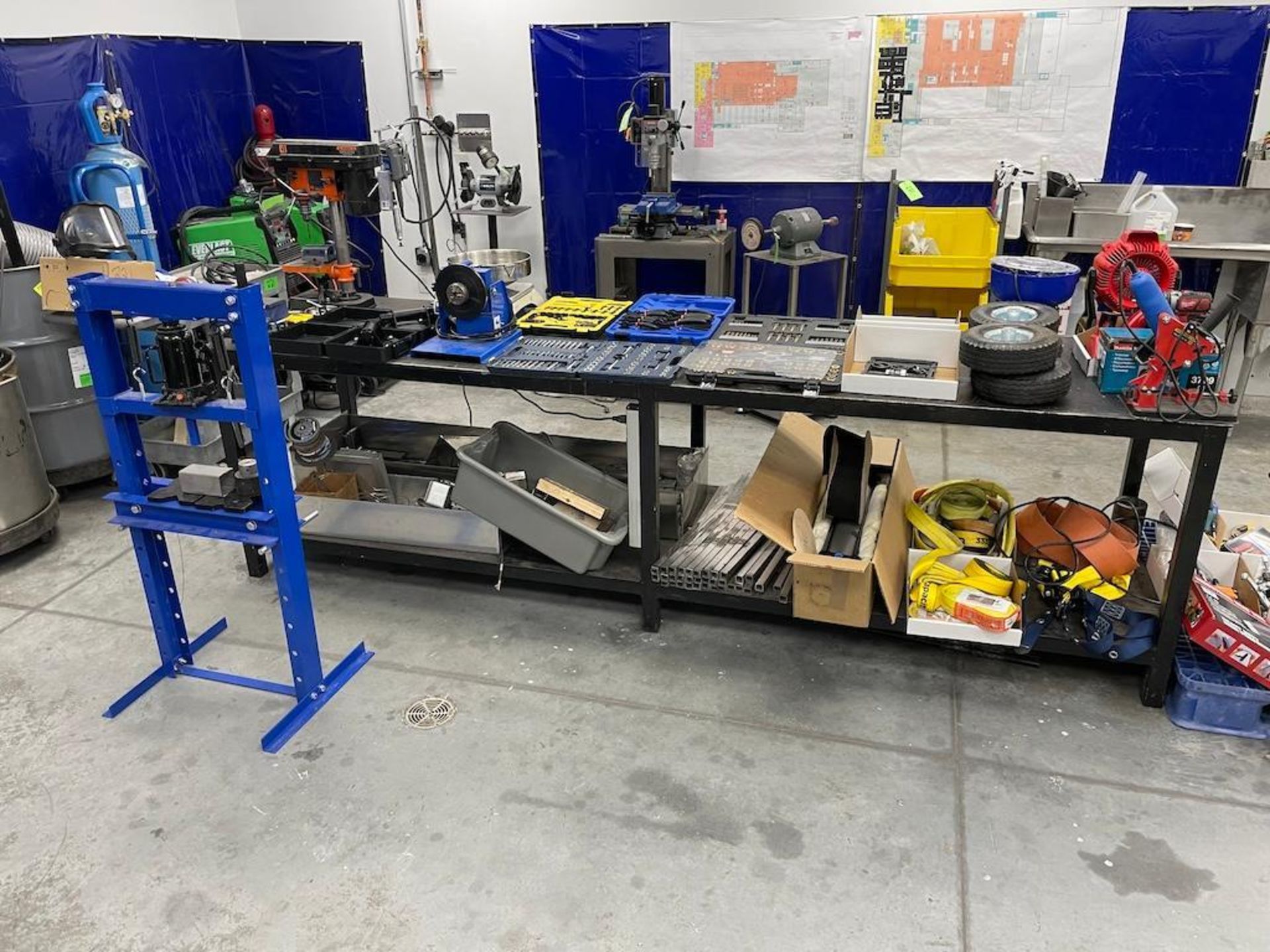 LOT HEAVY DUTY STEEL TABLE 10 FT X 30 IN, INCLUDING CONTENTS, 12 TON SHOP PRESS, DRILL PRESS, VISE,