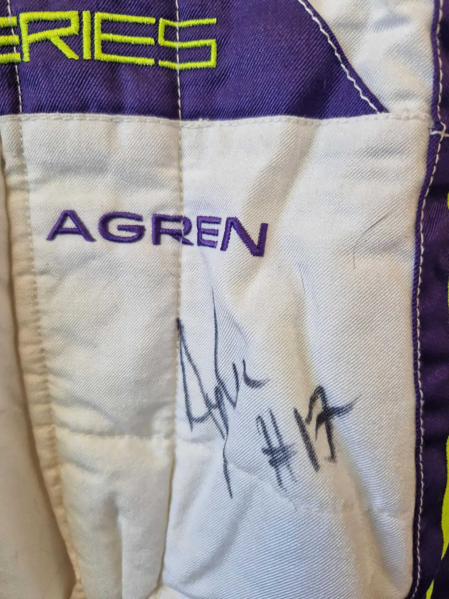 One PUMA FIA approved Race Suit (Size - Made to Measure) worn by Ayla Agran and signed by her with a - Image 2 of 2