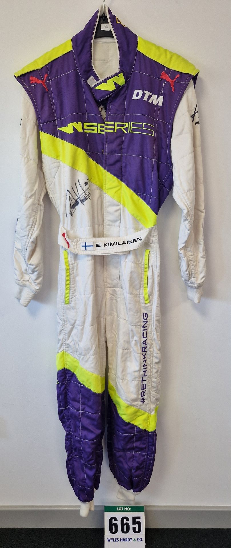 One PUMA FIA approved Race Suit (Size 48) worn by Emma Kimilainen and signed by her with a Kit Bag