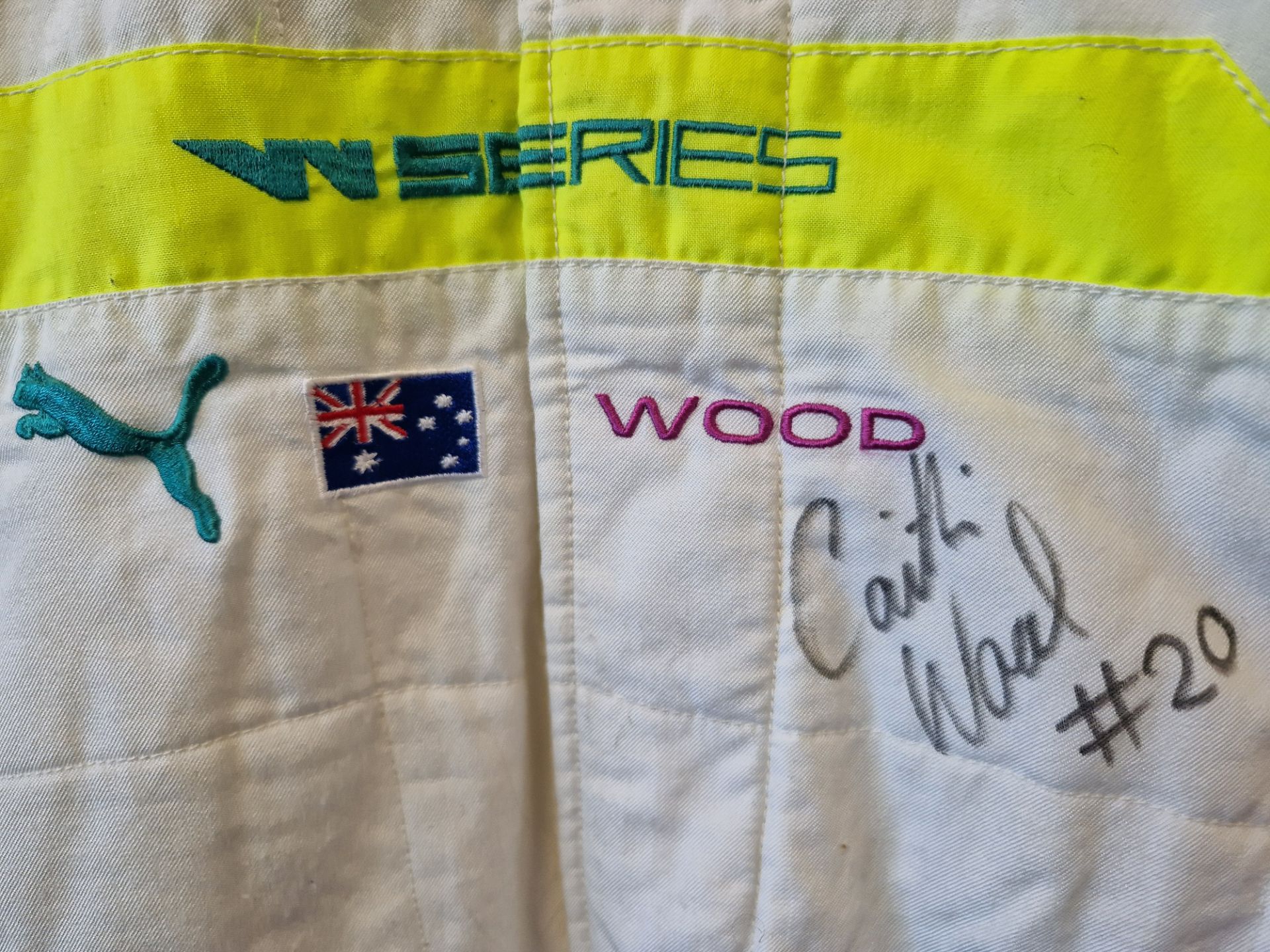 One PUMA FIA approved Race Suit (Size - Made to Measure) worn by Caitlin Wood and signed by her with - Image 2 of 2