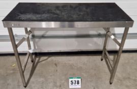 One 1200mm x 600mm Stainless Steel Folding Table with Rubber Mat covered Top Surface