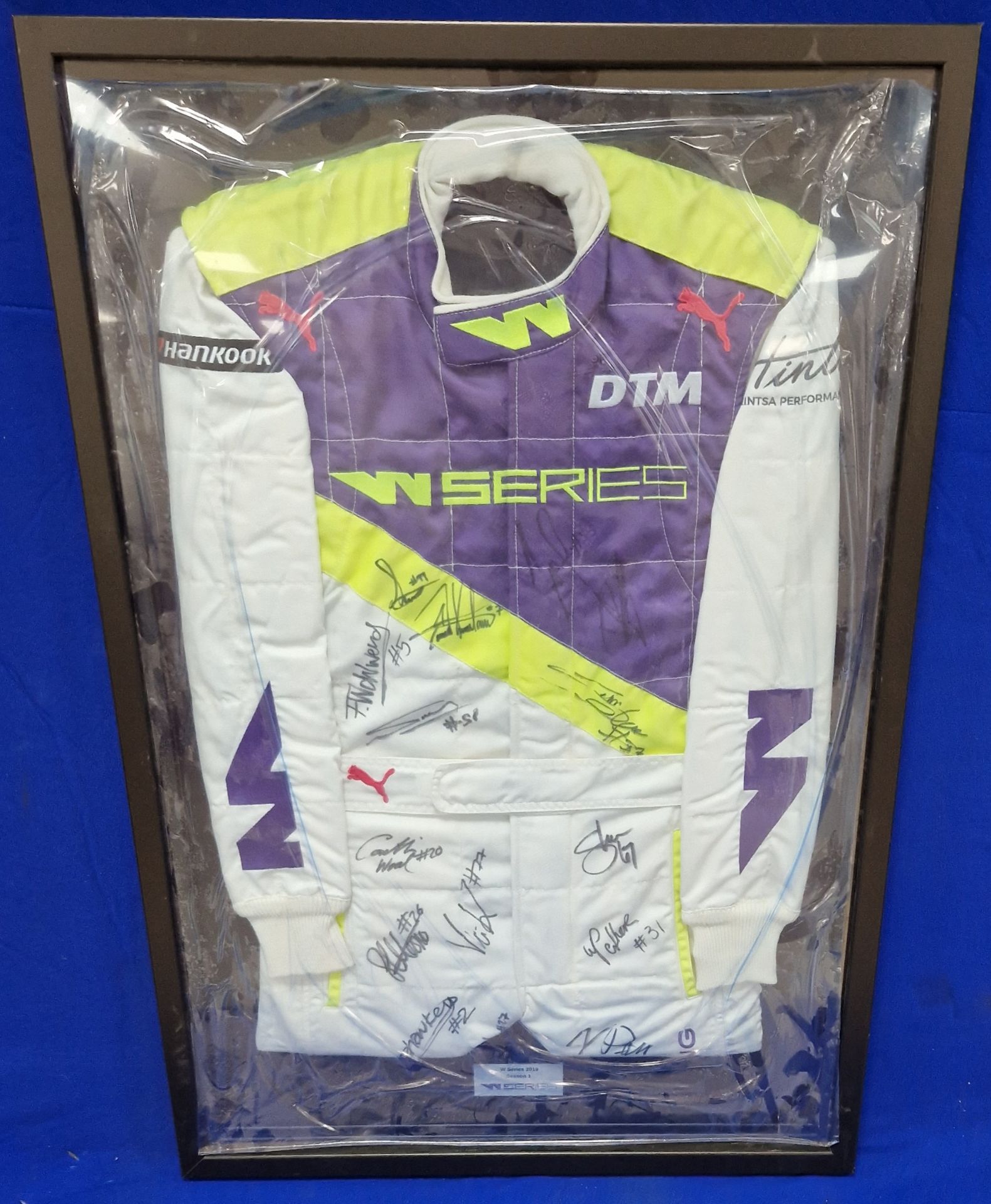A Framed & Glazed (Perspex) W Series Race Suit Signed by The Drivers Commemorating the 2019 Series
