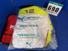 One Unworn PUMA FIA approved Suit (Size - Made to Measure) embroidered with the name L. Brewer in a