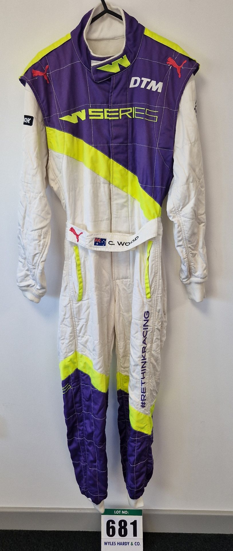 One PUMA FIA approved Race Suit (Size - Made to Measure) worn by Caitlin Wood with a Kit Bag