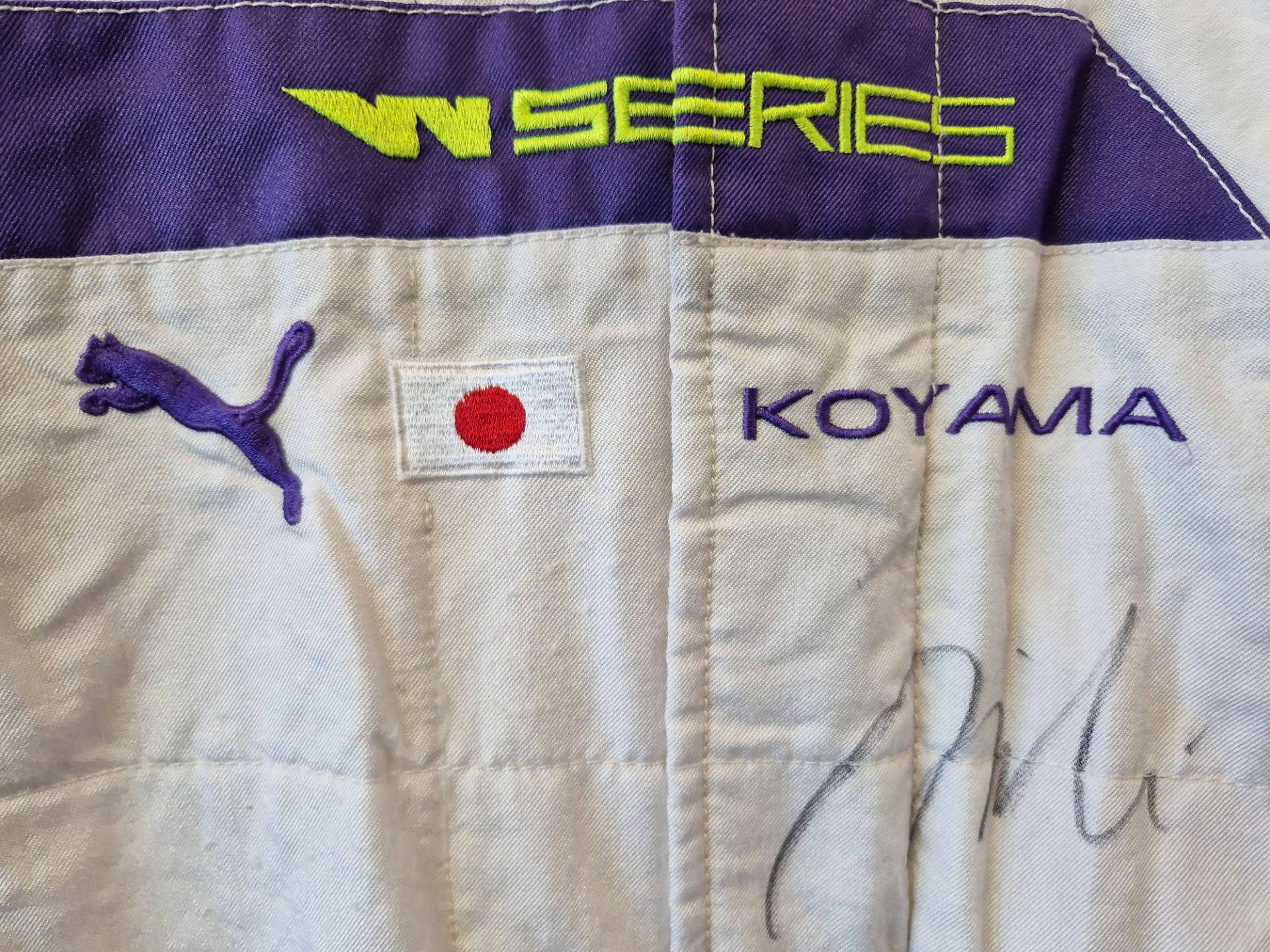 One PUMA FIA approved Race Suit (Size - Made to Measure) worn by Miki Koyama and signed by her - Image 2 of 2