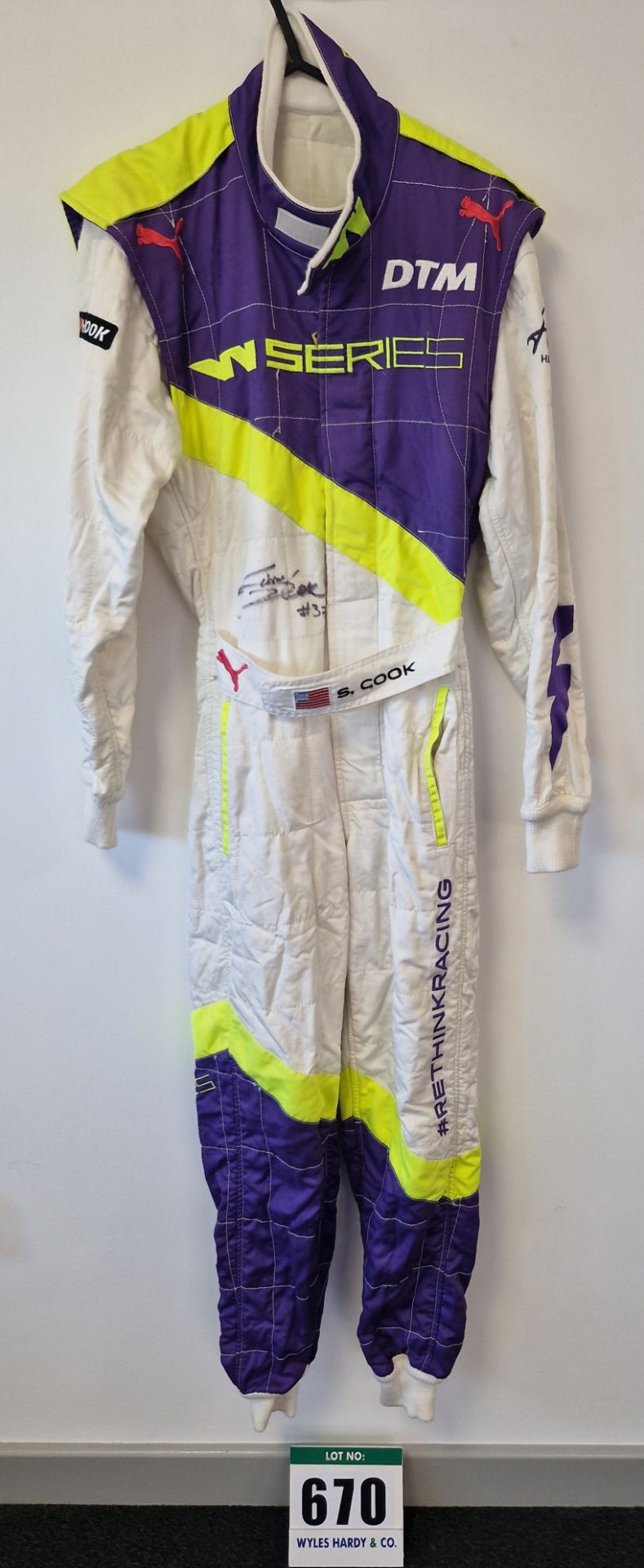 One PUMA FIA approved Race Suit (Size - Made to Measure) worn by Sarah Cook and signed by her with a