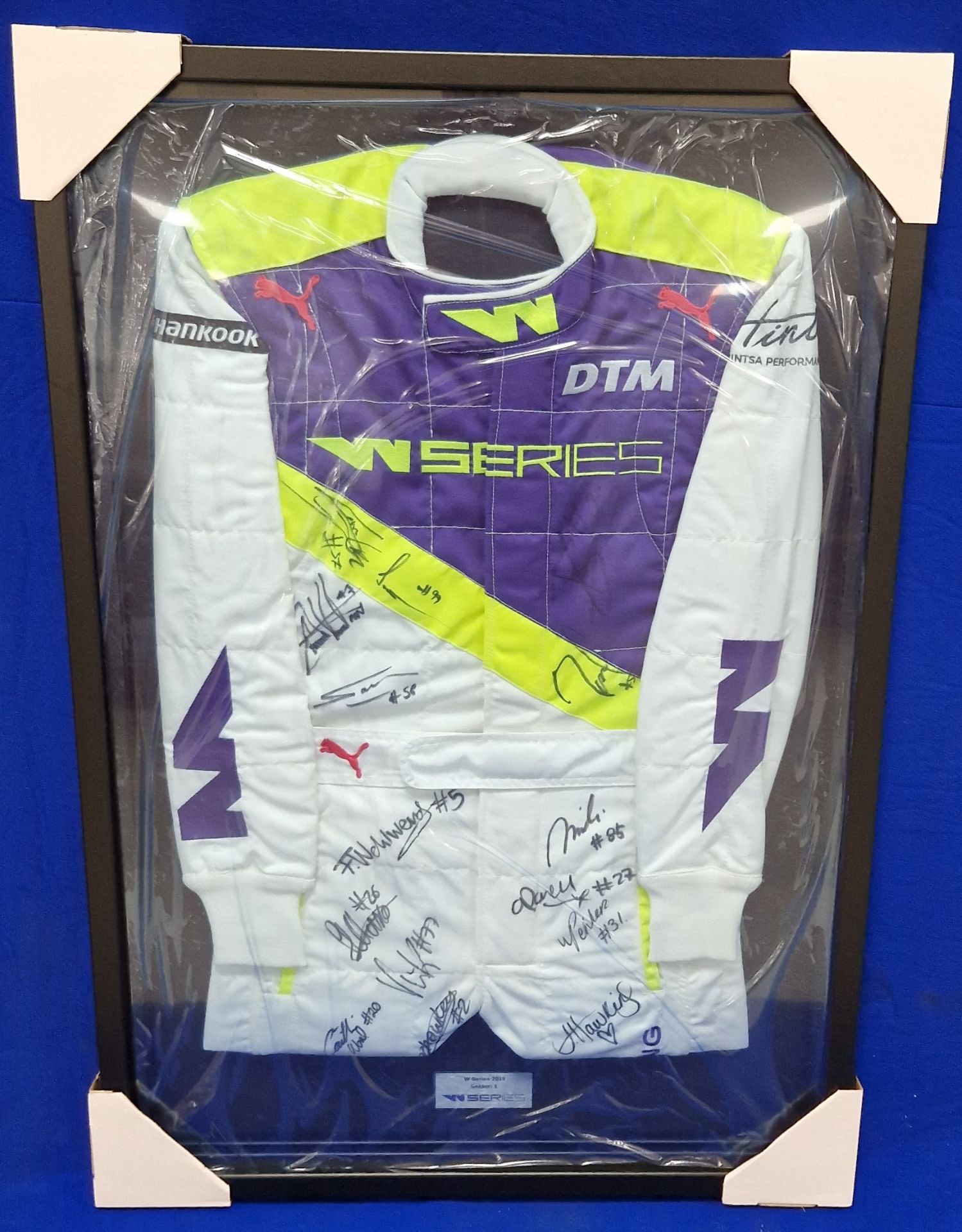 A Framed & Glazed (Perspex) W Series Race Suit Signed by The Drivers Commemorating the 2019 Series