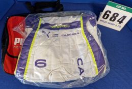 One Unworn PUMA FIA approved Suit (Size - Made to Measure) embroidered with the name M. Caceres in a