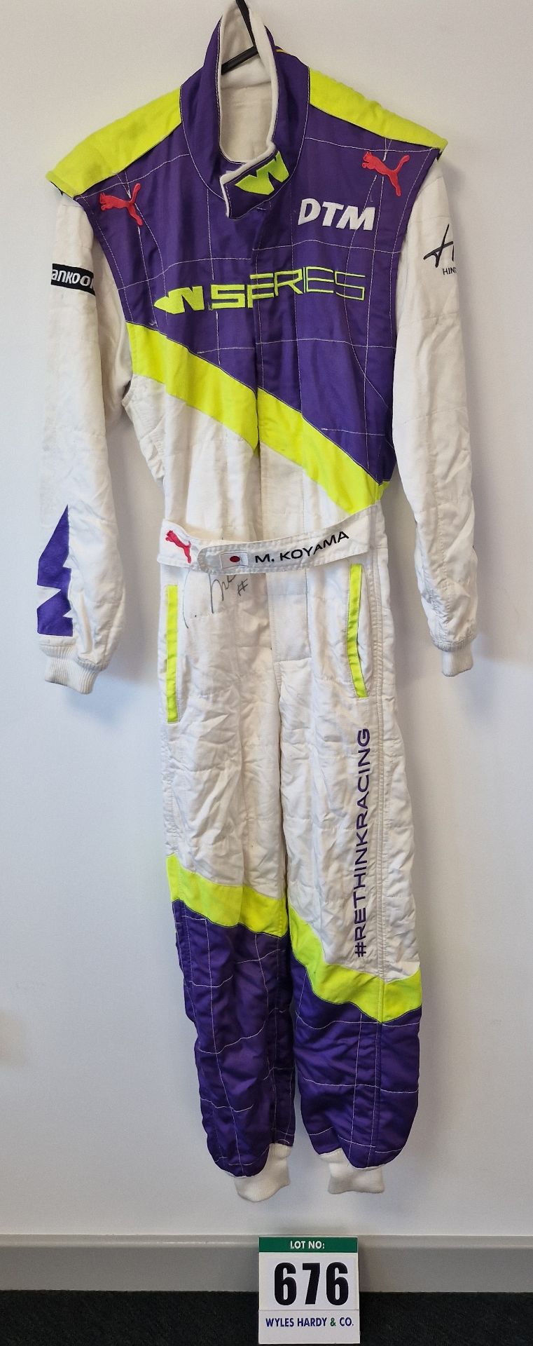 One PUMA FIA approved Race Suit (Size 44) worn by Miki Koyama and signed by her