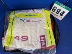 One Unworn PUMA FIA approved Suit embroidered with the name A. Pulling in a Kit Bag