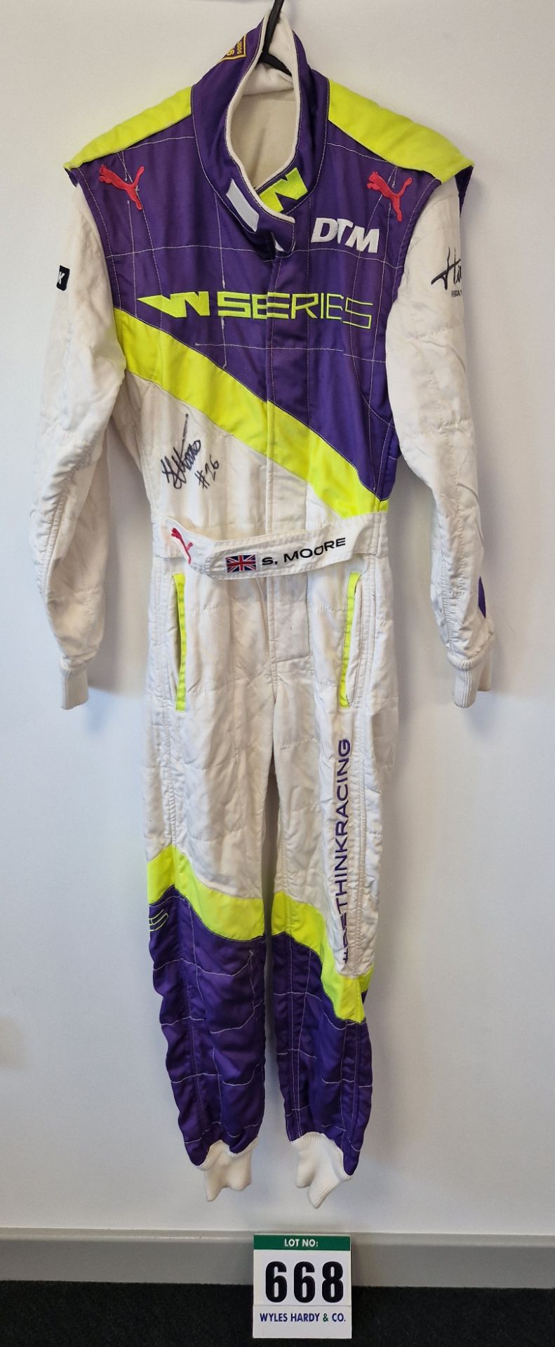 One PUMA FIA approved Race Suit (Size - Made to Measure) worn by Sarah Moore and signed by her with
