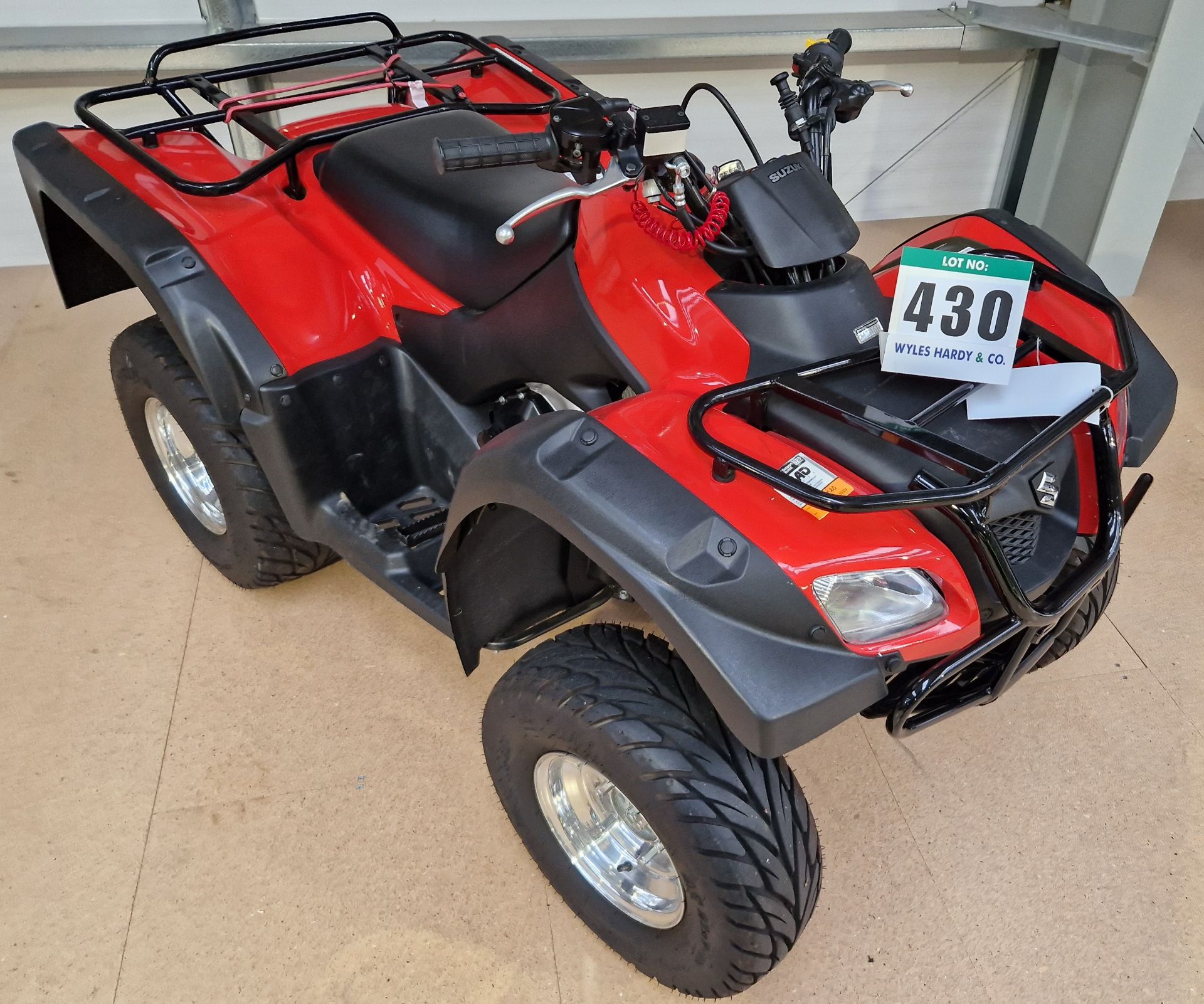 One SUZUKI LT-F250 Quad Bike with fitted Luggage Racks Front and Rear