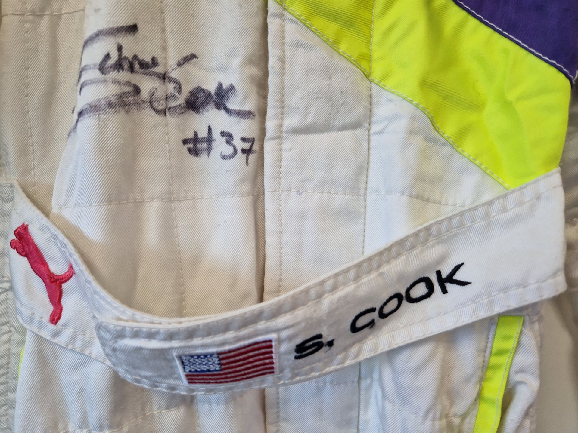 One PUMA FIA approved Race Suit (Size - Made to Measure) worn by Sarah Cook and signed by her with a - Image 2 of 2