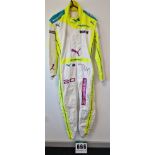 One PUMA FIA approved Race Suit (Size - Made to Measure) worn by Caitlin Wood and signed by her with