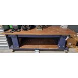 One 96 inch x 36 inch Castor mounted Heavy Timber Workbench with fitted Lower Shelf