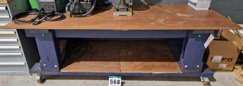 One 96 inch x 36 inch Castor mounted Heavy Timber Workbench with fitted Lower Shelf