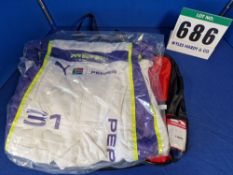 One Unworn PUMA FIA approved Suit (Size - Made to Measure) embroidered with the name T. Pepper in a