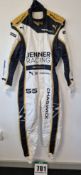 One PUMA FIA approved Race Suit in JENNER RACING Colours bearing the name Chadwick for Jamie