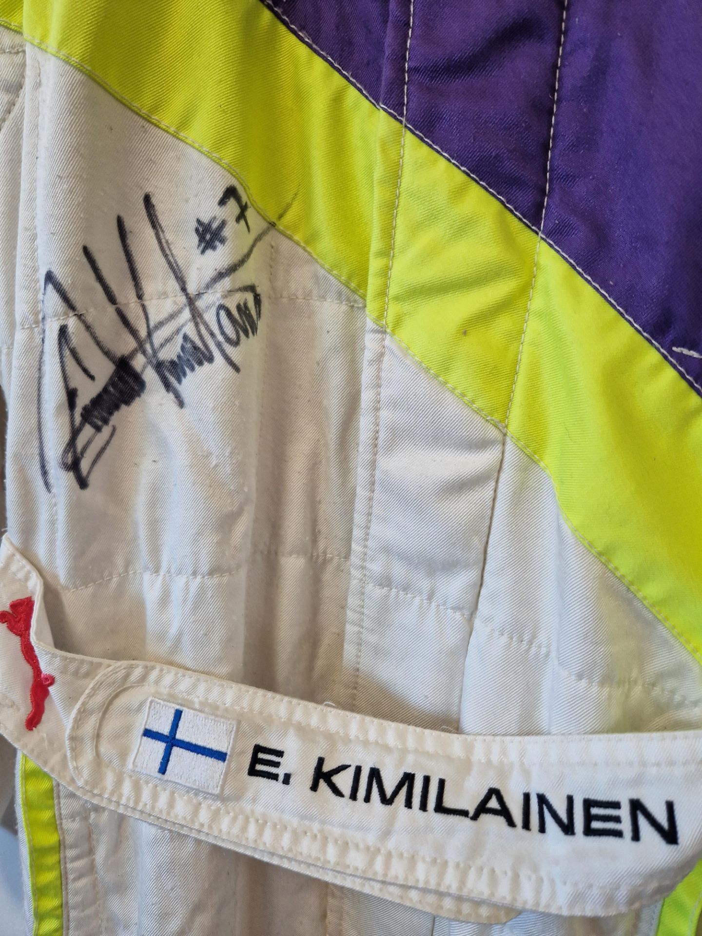 One PUMA FIA approved Race Suit (Size 48) worn by Emma Kimilainen and signed by her with a Kit Bag - Image 2 of 2