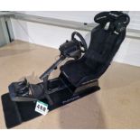 One PLAYSEAT E Sports Gaming Seat and Frame with a LOGITECH Steering Wheel and Pedal Box and a Set