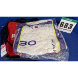 One Unworn PUMA FIA approved Suit (Size - Made to Measure) embroidered with the name C. Kamper in a