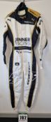 One PUMA FIA approved Race Suit in JENNER RACING Colours, bearing the name Chambers for Chloe